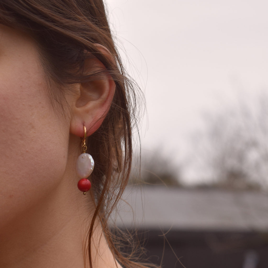 Coin freshwater pearl huggie earrings with red coral bead | by Ifemi Jewels