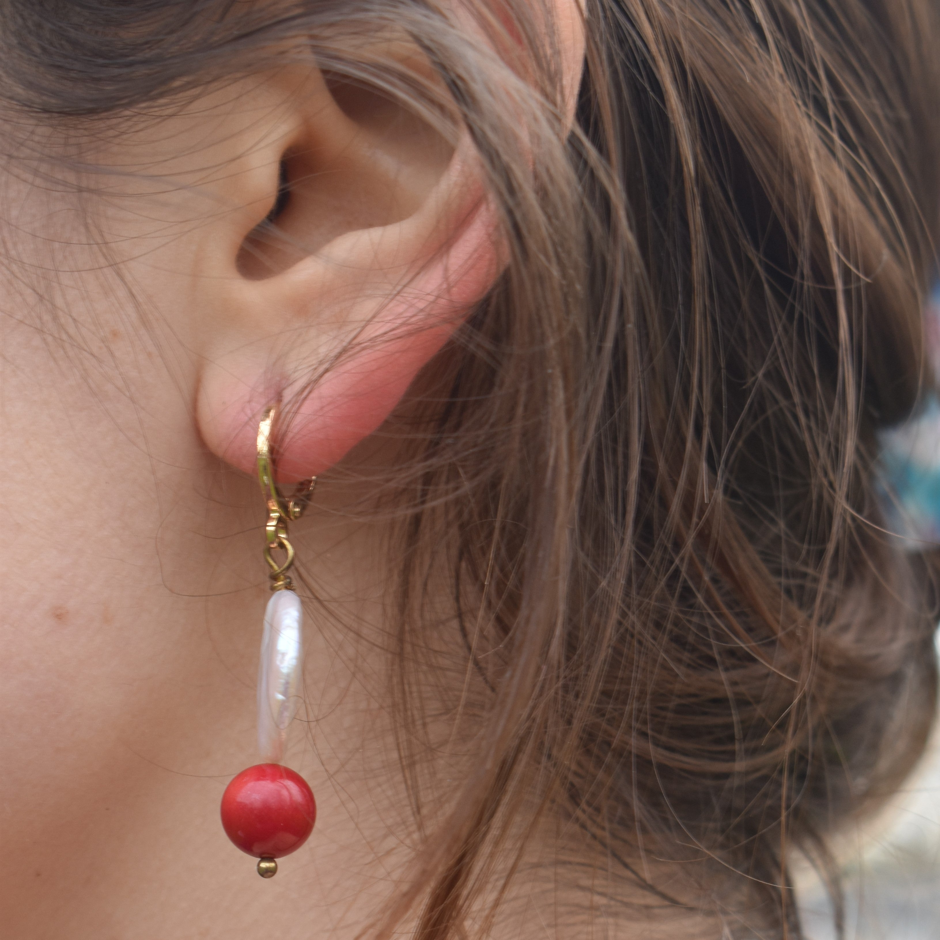 Coin freshwater pearl huggie earrings with red coral bead | by Ifemi Jewels