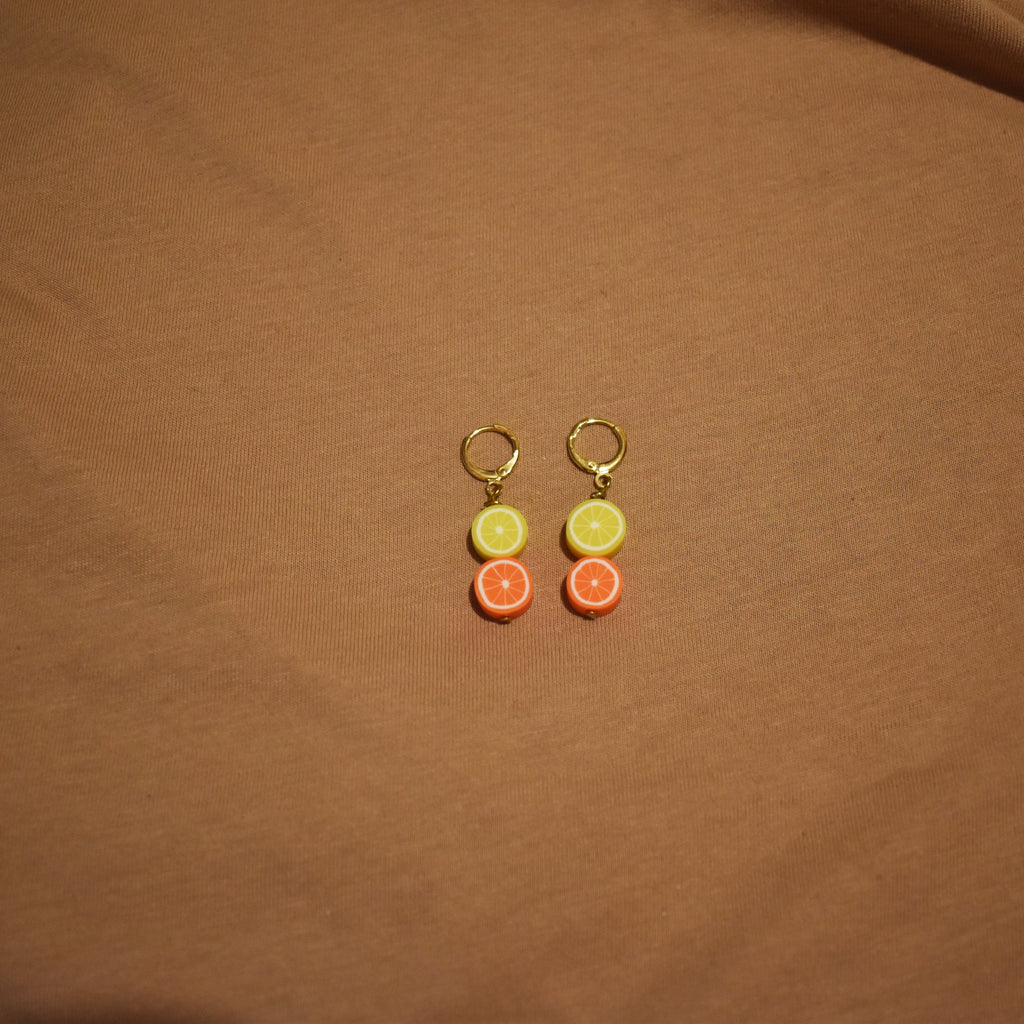 Lemon Yellow Orange huggie earrings | by Ifemi Jewels