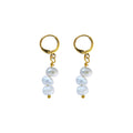 Irregular white freshwater pearl earrings | by Ifemi Jewels